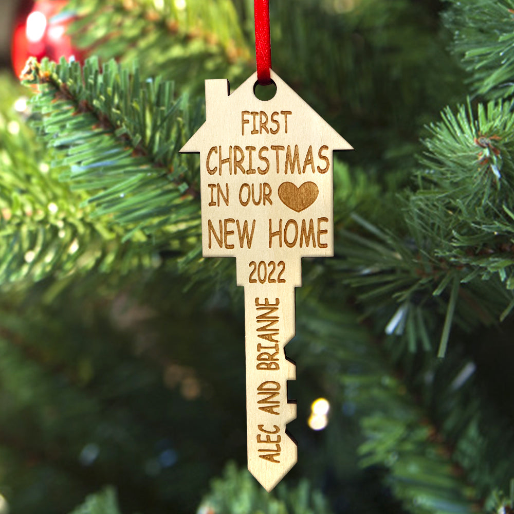 Wooden key-shaped Christmas ornament reading 'First Christmas in Our New Home' 2022, a perfect housewarming gift.