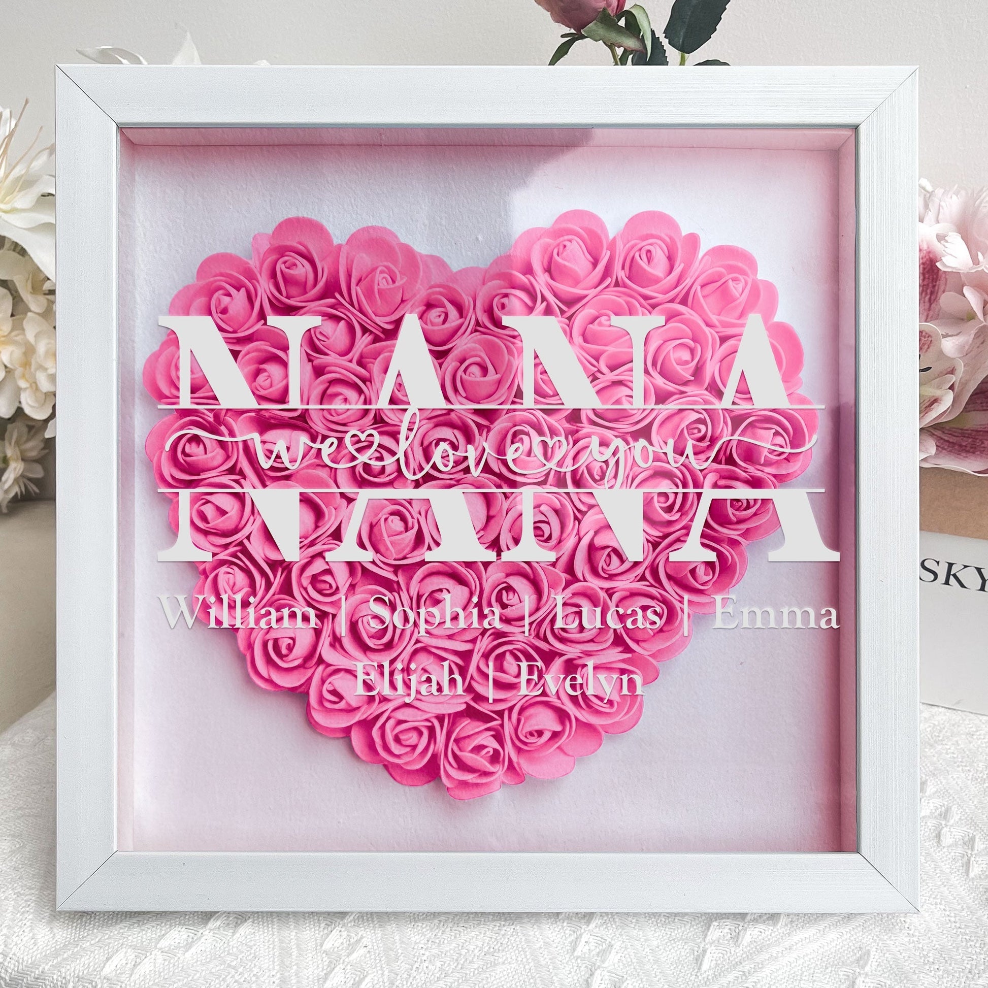 Personalized MAMA flower shadow box for Mom. Pink heart-shaped flower arrangement, white MDF frame, Mother's Day Gift.