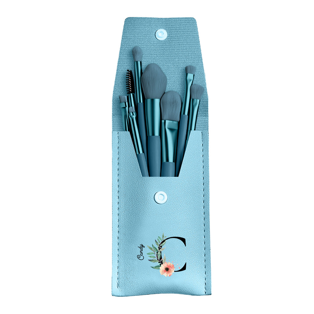 Personalized flower PU leather makeup brush bag set in light blue, includes 8 makeup brushes.